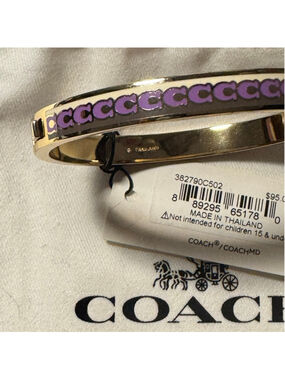 Coach repeating, C logo, gold, and purple hinged enamel bracelet
